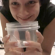 Mandy Flores takes a hard, clumpy shit into a plastic container without wearing any makeup. She uses her fingers to help pull out the sticky turd - most likely taken from a custom request. 720P HD. About 3 minutes.